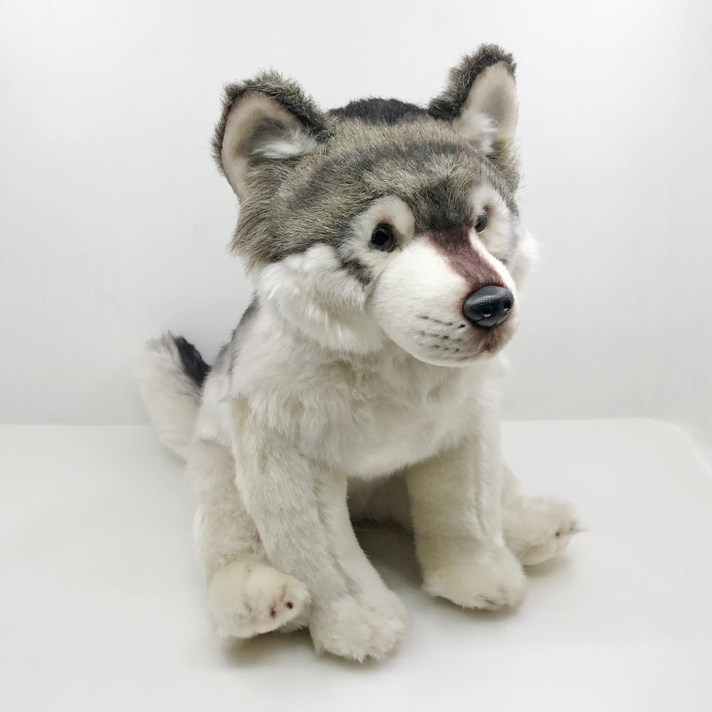 Grauer wolf kuscheltier