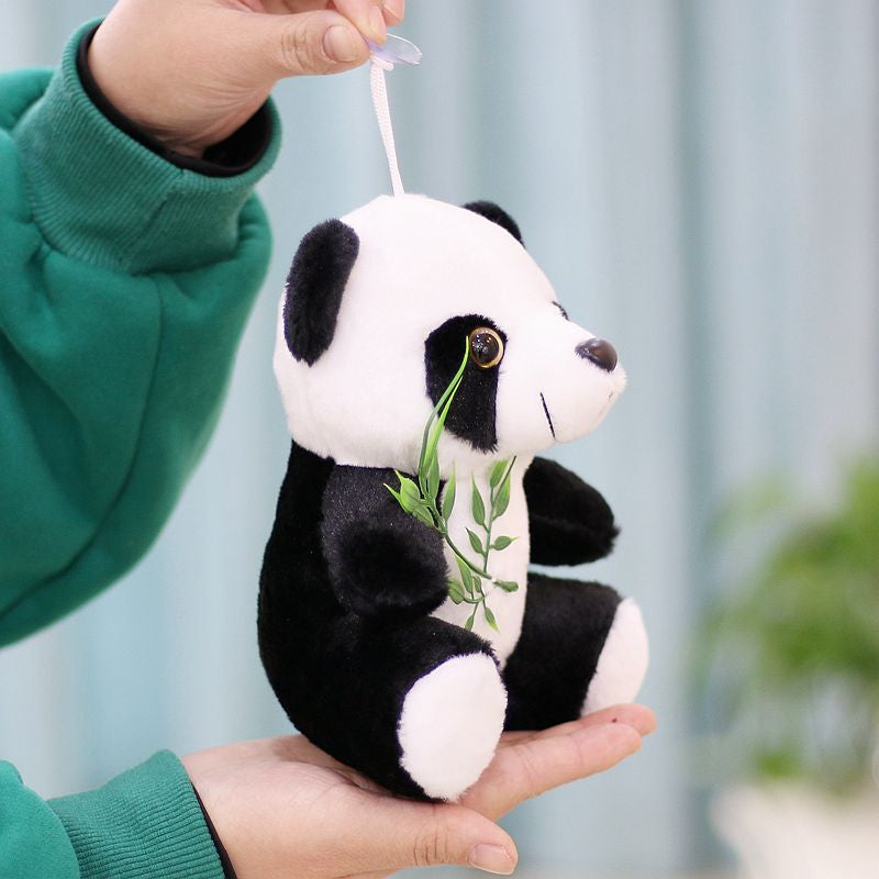 Panda Plüschtier mit Baum
