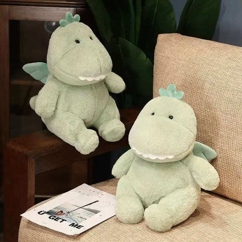 Grüner Dino Plüsch mit kleinen Augen