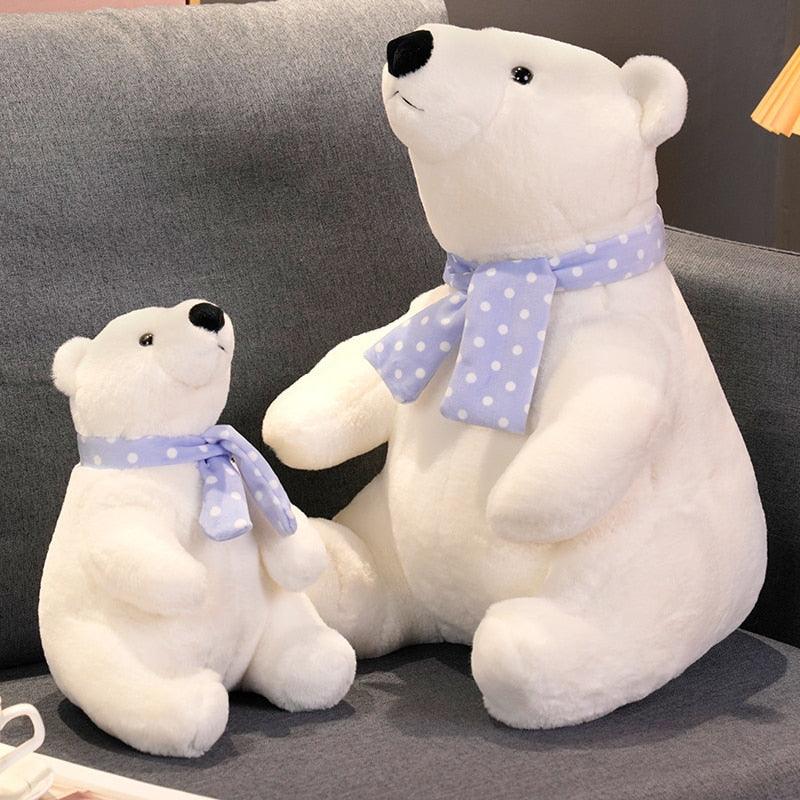 Niedlicher sitzender Eisbär mit Schal Plüschtier