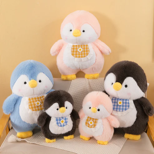 Kuscheliger Baby Pinguin mit Lätzchen - Plüschtier Freund