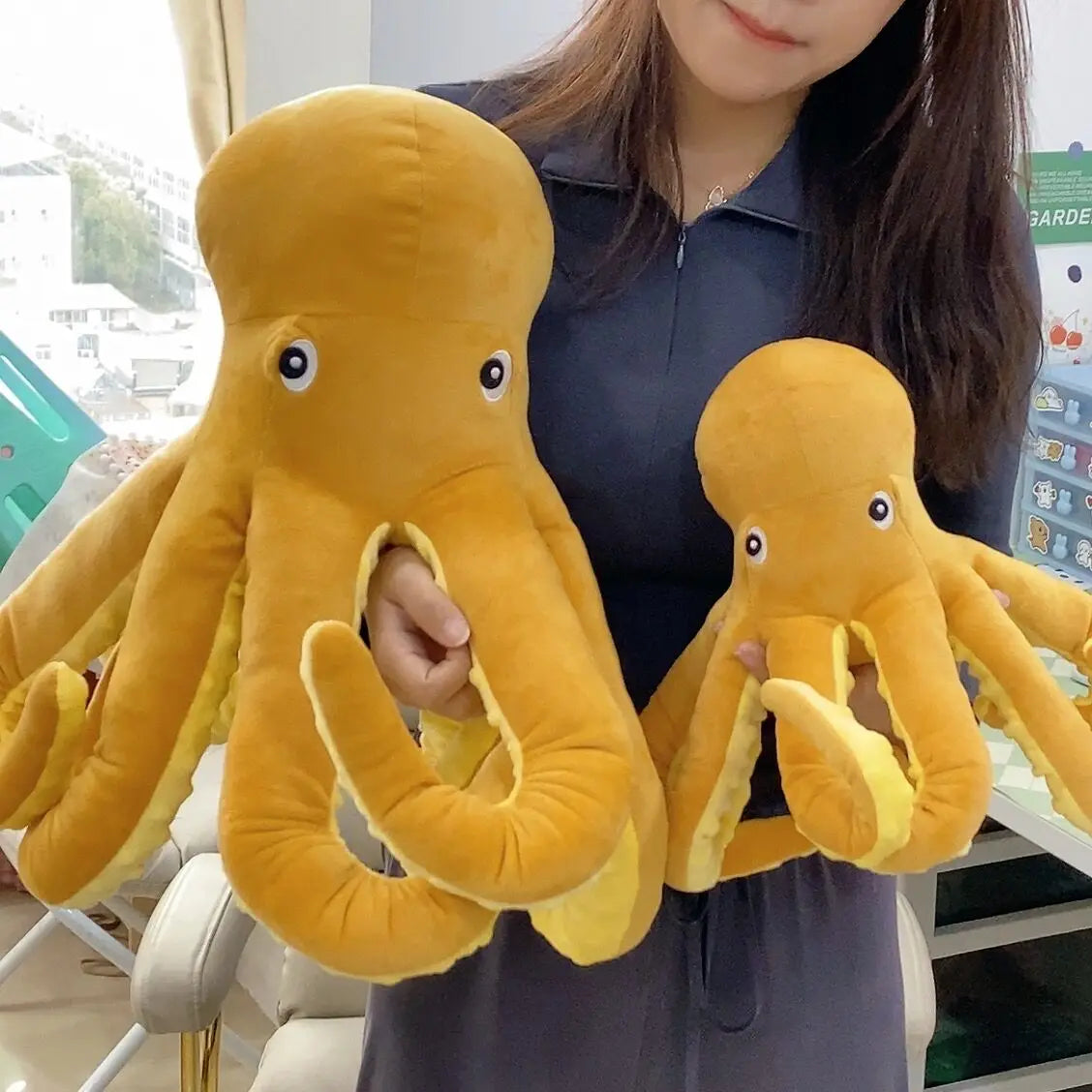 Gelber tintenfisch plüsch oktopus