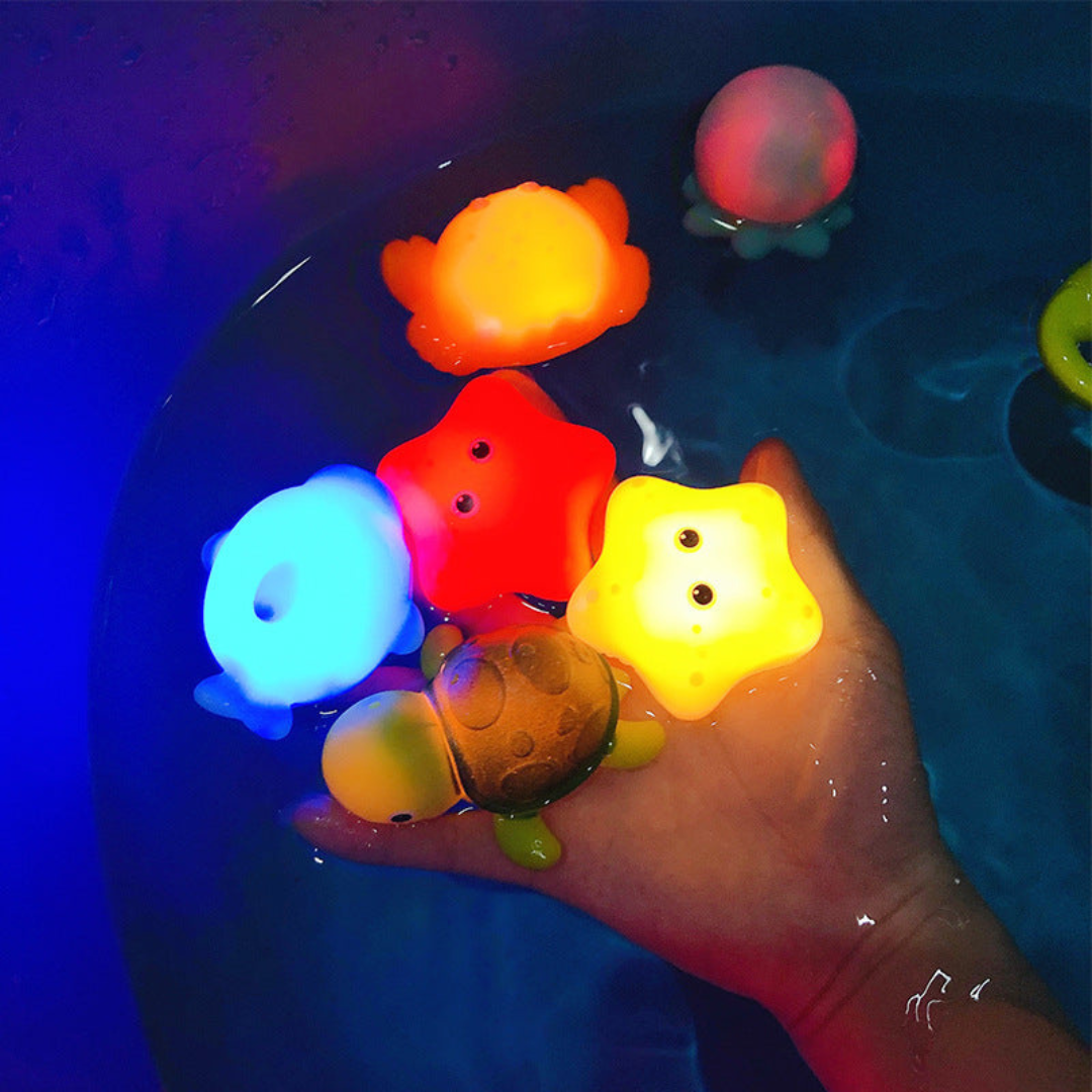 Leuchtendes badespielzeug für kinder