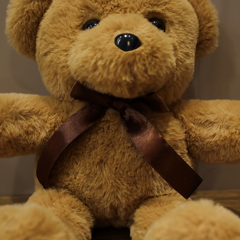 Kuschelbär mit Schleife