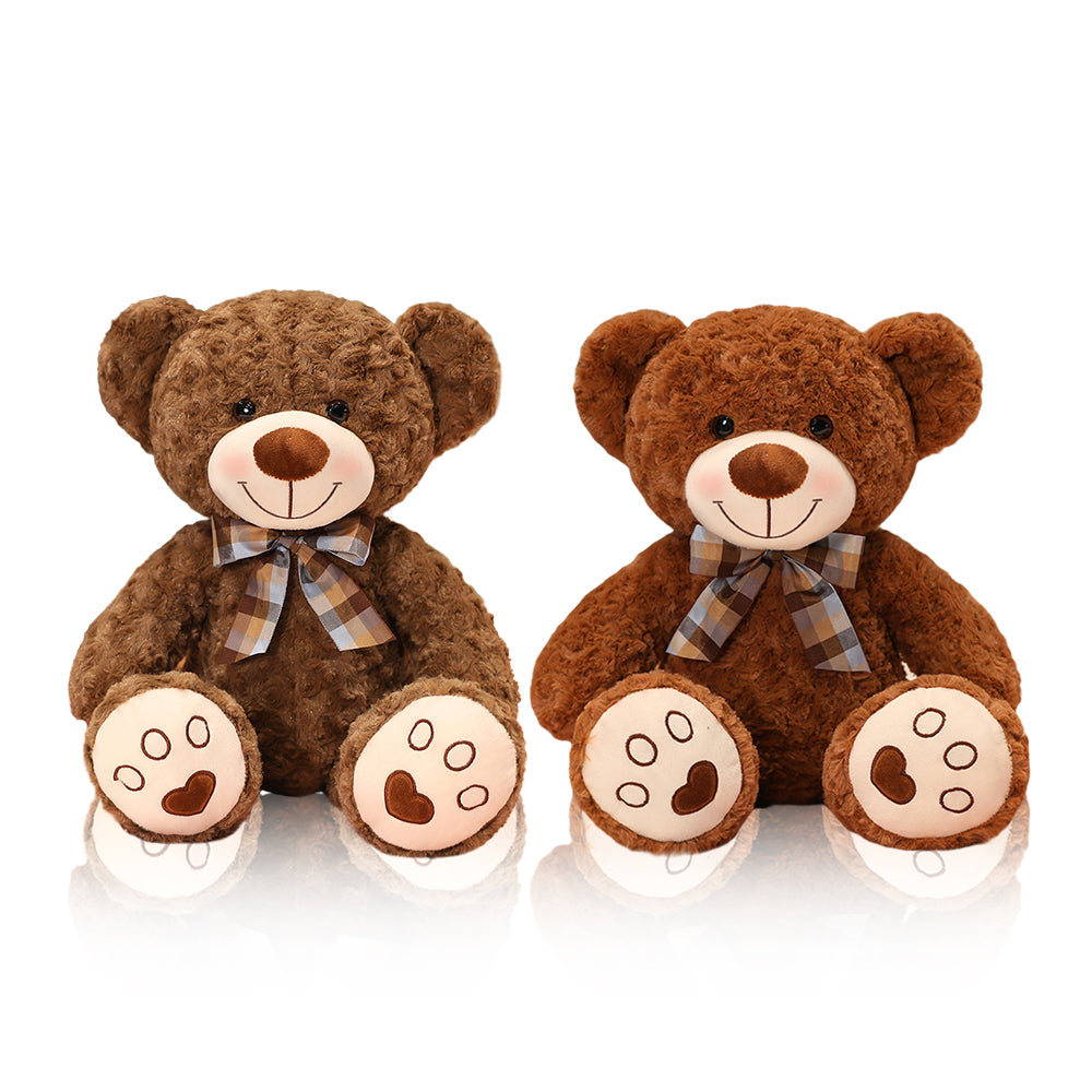 Teddybär mit Herzen auf den Pfoten