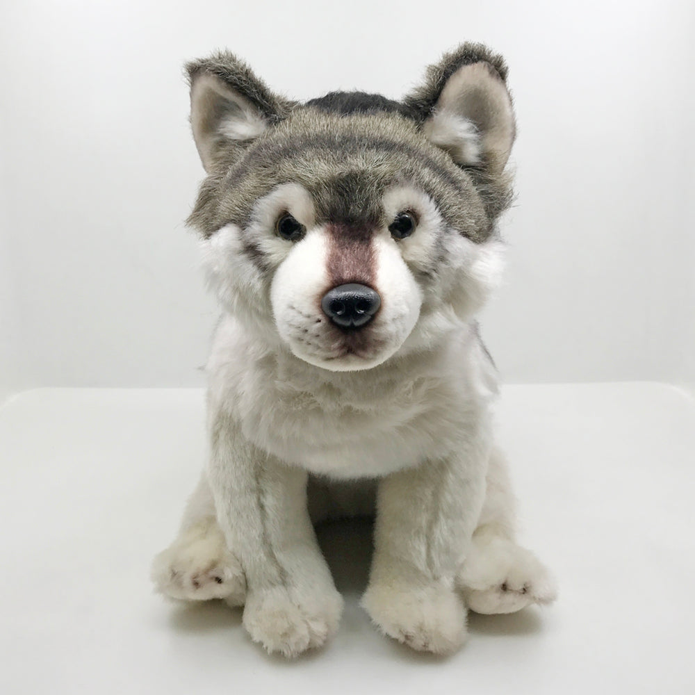 Grauer wolf kuscheltier
