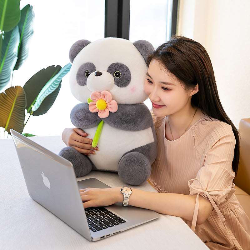 Blumenliebender Panda Plüschtier