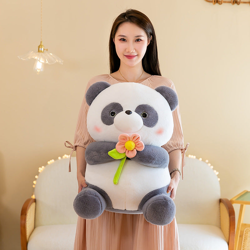 Blumenliebender Panda Plüschtier