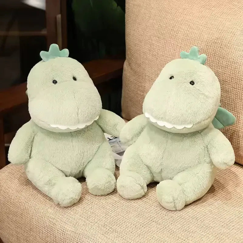 Grüner Dino Plüsch mit kleinen Augen