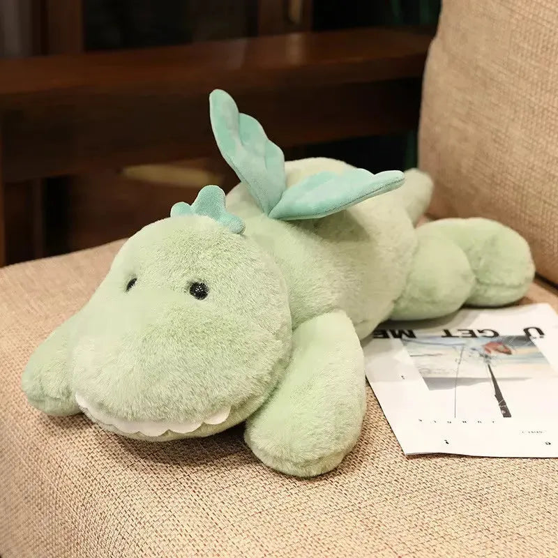 Grüner Dino Plüsch mit kleinen Augen