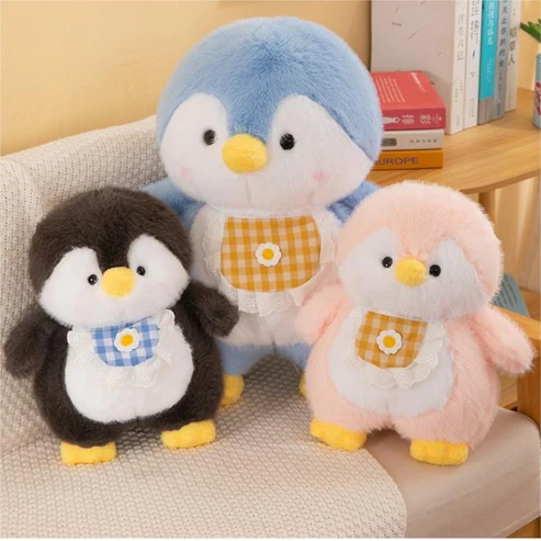 Kuscheliger Baby Pinguin mit Lätzchen - Plüschtier Freund