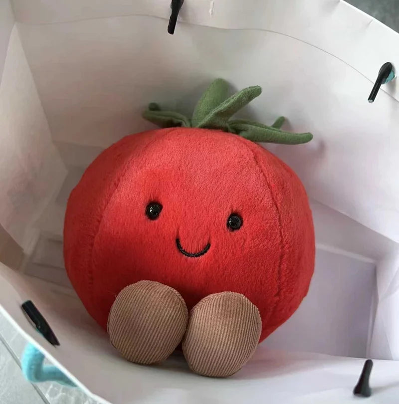 Freundliche tomate als plüschtier
