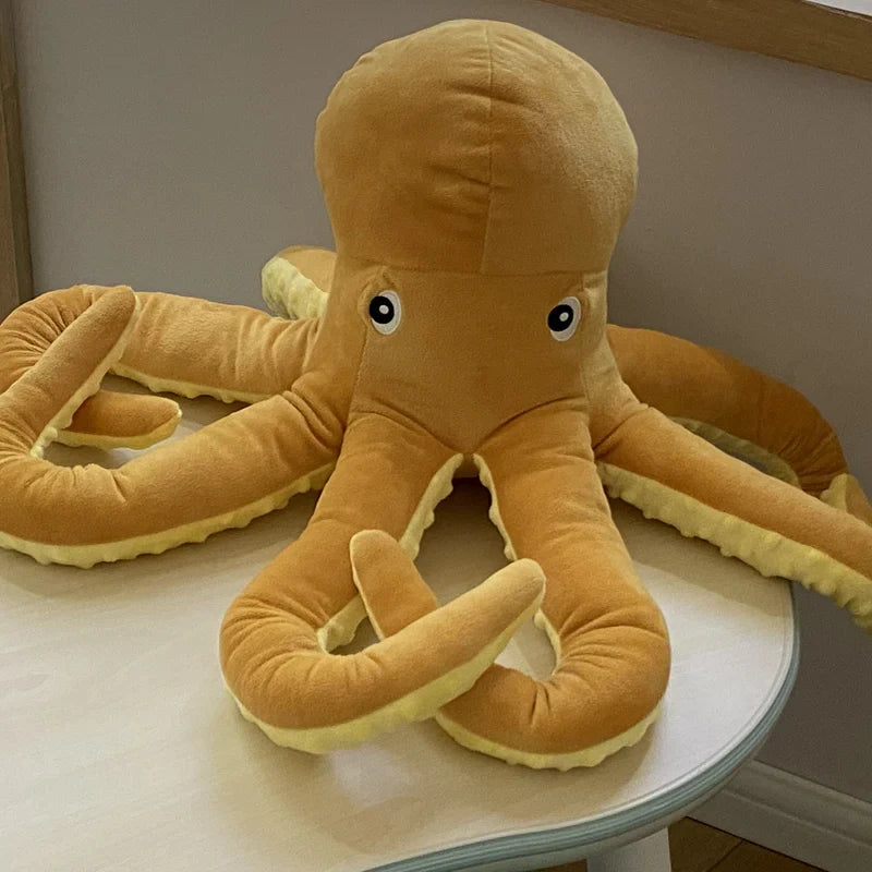 Gelber tintenfisch plüsch oktopus