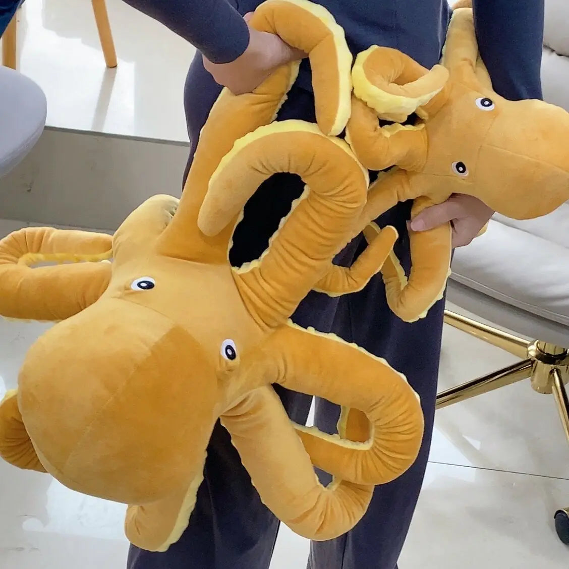 Gelber tintenfisch plüsch oktopus
