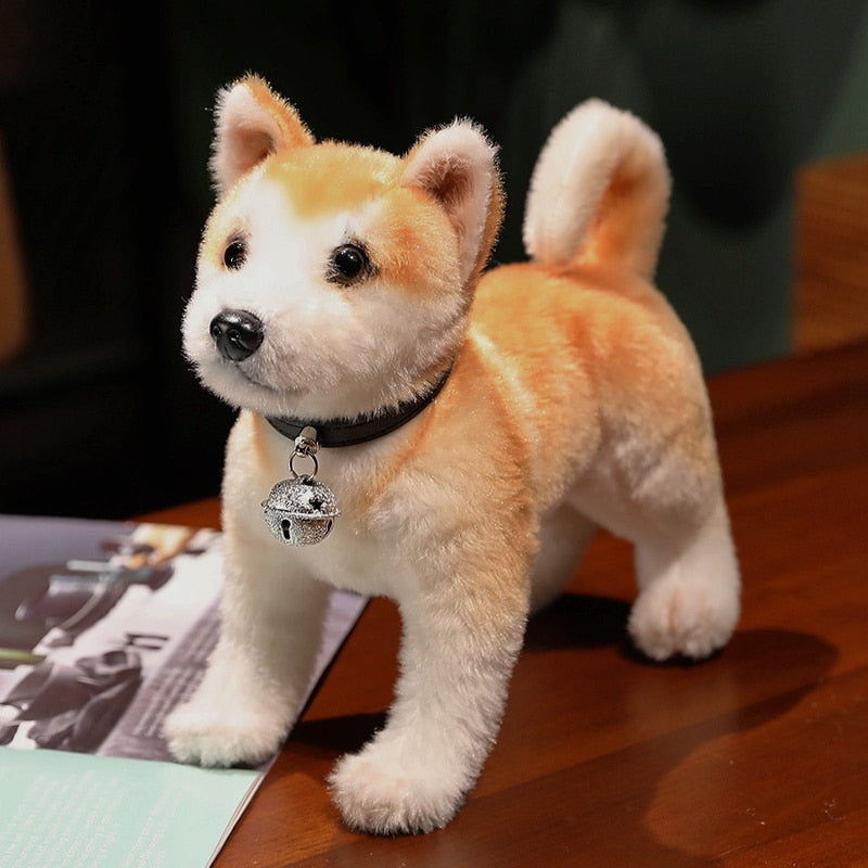 image of an adorable shiba inu stuffed animal plush toy lying on the table