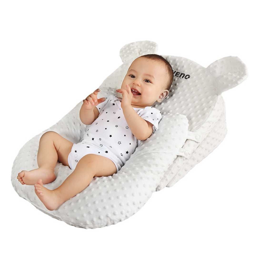 Baby Kissen in verschiedenen Höhenstufen