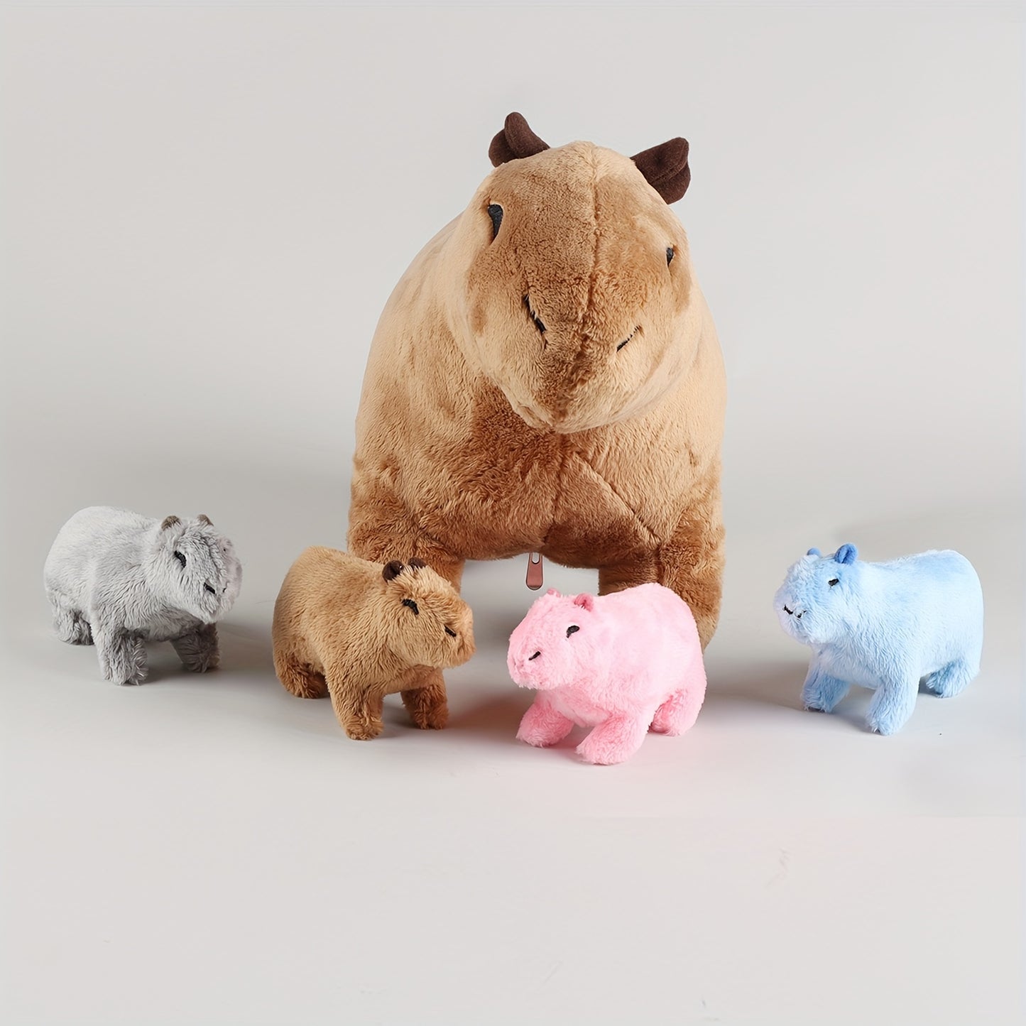 Cappy - Plüsch Capybara mit Babyfiguren