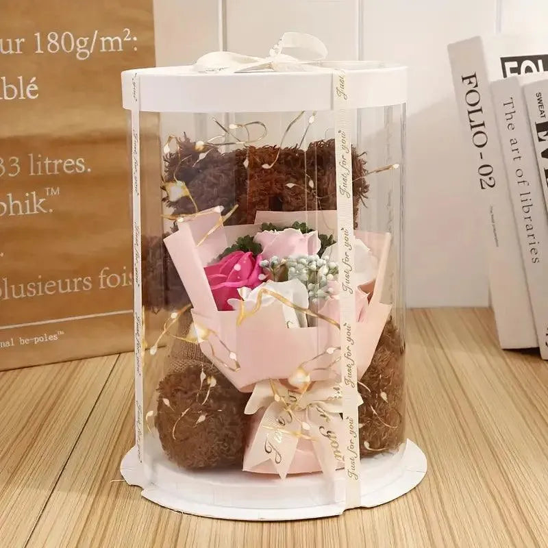 Niedlicher Teddybär mit Blumenstrauß
