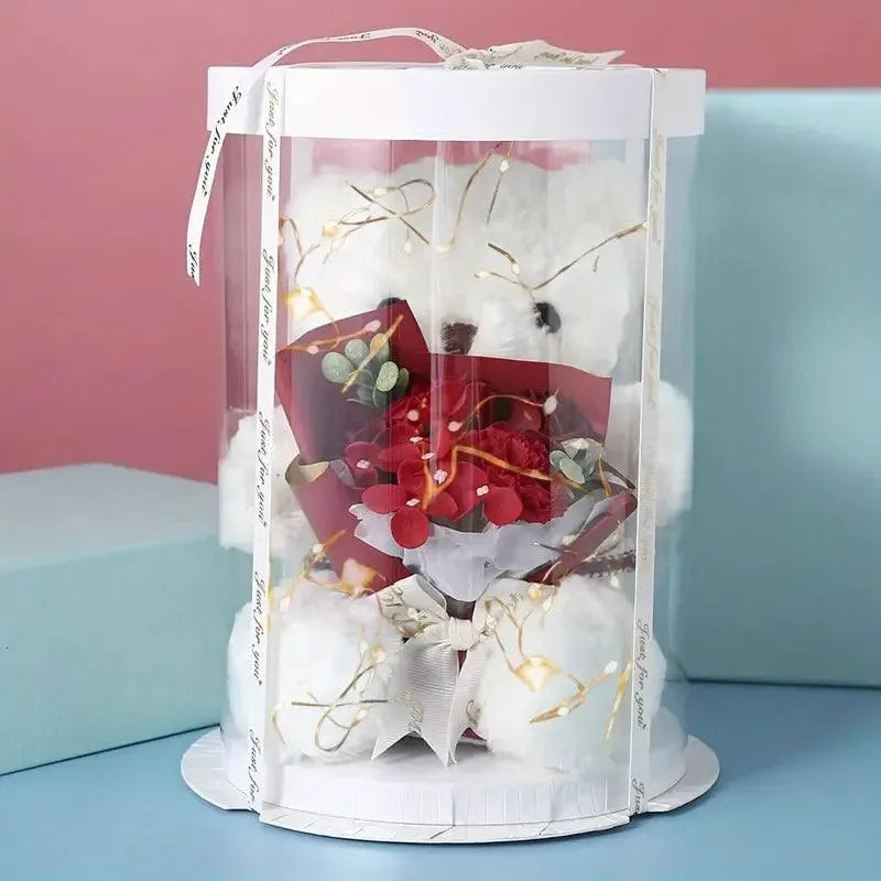 Niedlicher Teddybär mit Blumenstrauß