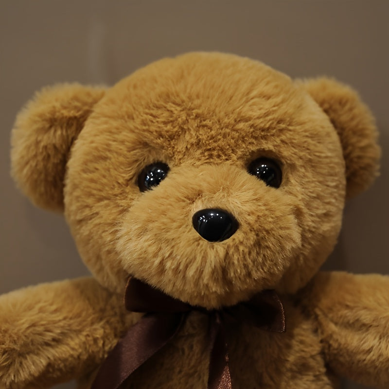 Kuschelbär mit Schleife