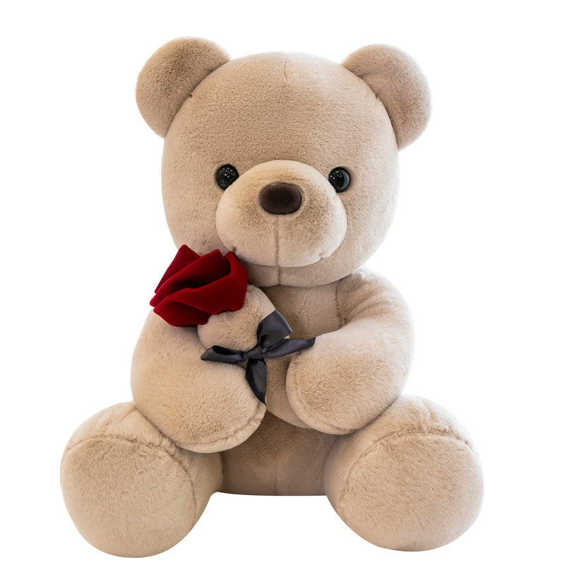 Teddybär mit Rose in der Hand