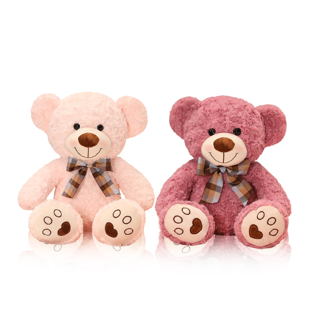 Teddybär mit Herzen auf den Pfoten