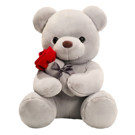 Teddybär mit Rose in der Hand