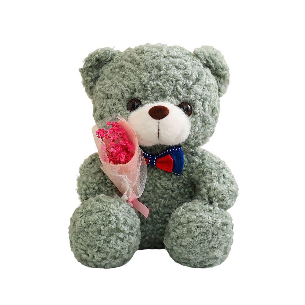 Teddybär mit Herzen auf den Pfoten