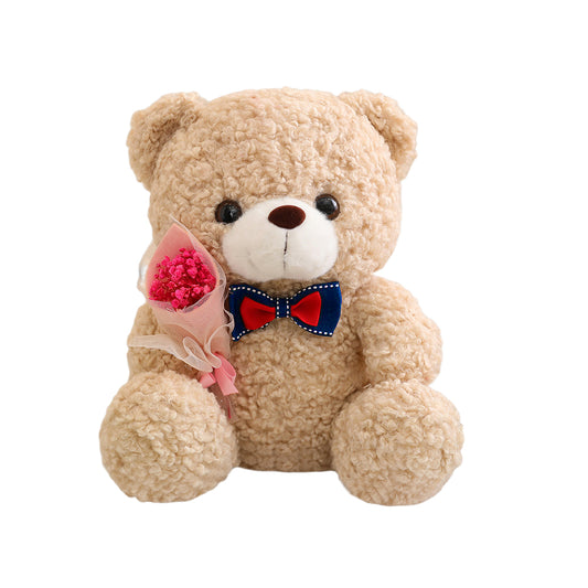 Teddybär mit Herzen auf den Pfoten