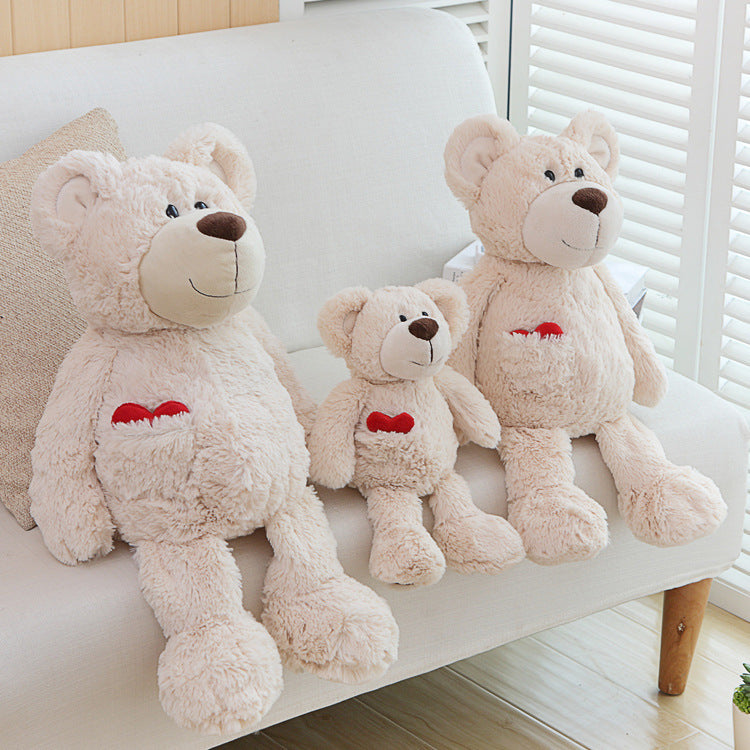 Teddybär mit Rose in der Hand