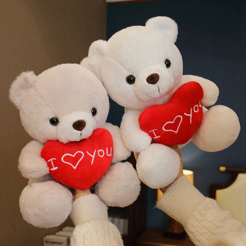 Teddybär mit Rose in der Hand