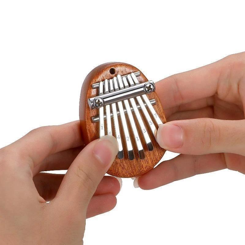 Woodie Kalimba - Entdecken Sie auf einzigartige Weise die Magie der Musik
