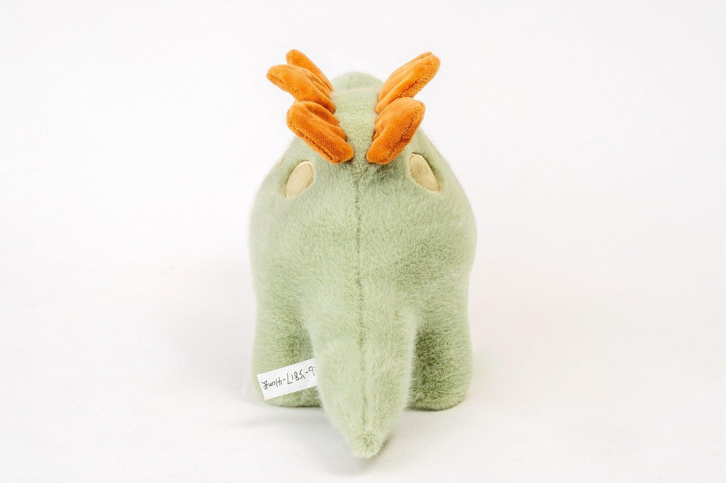 Grüner stegosaurus kuscheldino