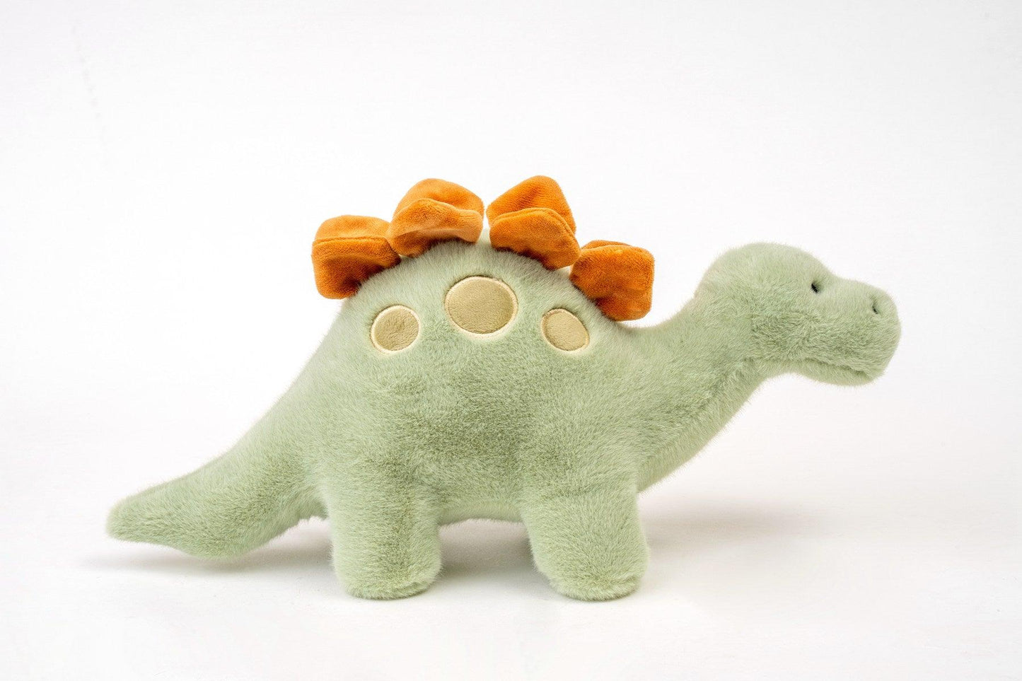 Grüner stegosaurus kuscheldino