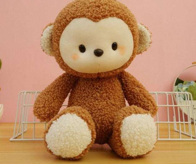 Niedliche Plüschtiere (Affen, Löwe, Elefant, Katze)