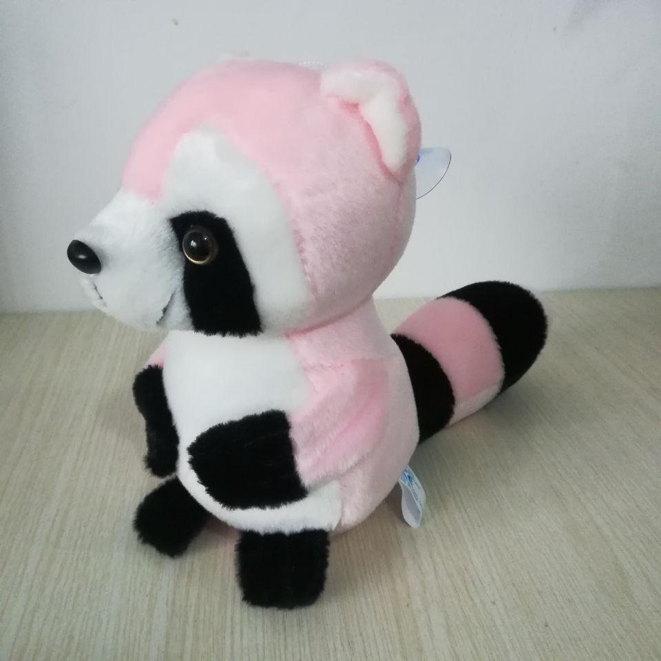Niedlicher rosa Waschbär Plüschtier