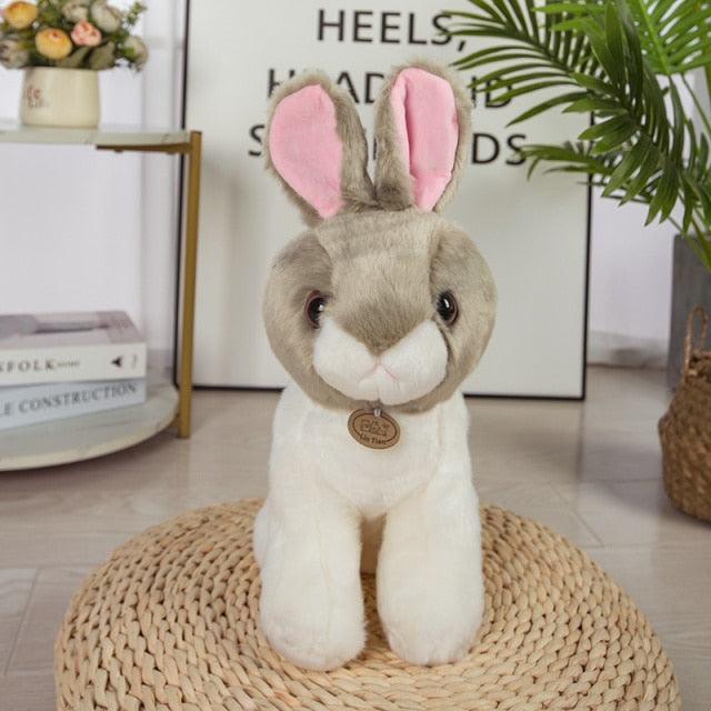 Echte lebensechte Kaninchen-Stofftiere